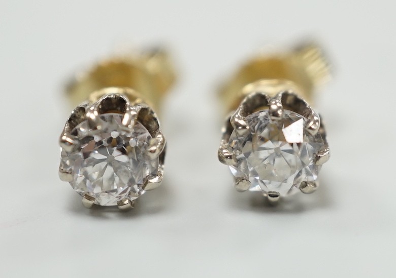 A pair of 585 yellow metal and solitaire diamond set ear studs, each stone weighing approx. 0.15-0.20ct, gross weight 1.7 grams.